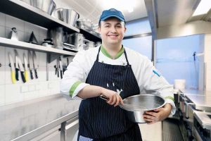 Teamfoto, Mitarbeiterportrait Mann, lächelnd, vor Business Hintergrund, Köln, Bonn, Düsseldorf, Essen, Leverkusen, NRW, Aachen.